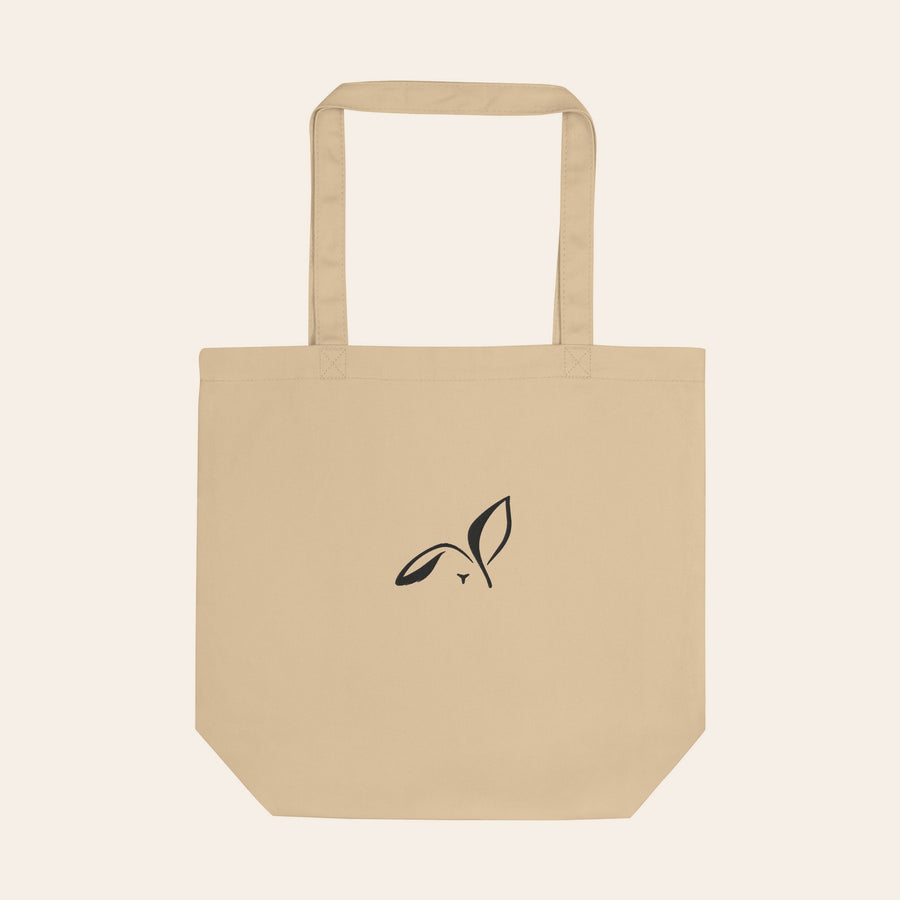 LOUPI GANG Everyday Organic Tote in Oyster, flat front view, black embroidered rabbit and long handles