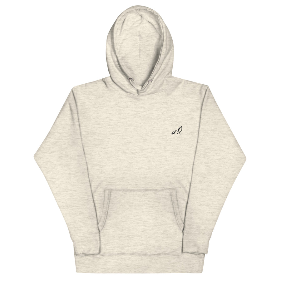 LOUPI GANG Quiet Rebel Hoodie in Oatmeal Heather — front view with black embroidered chest icon, digital product mockup