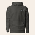 LOUPI GANG Noticed Later Hoodie in Vintage Black, front view, grey embroidered rabbit on the left chest and a small grey rabbit on the right cuff.