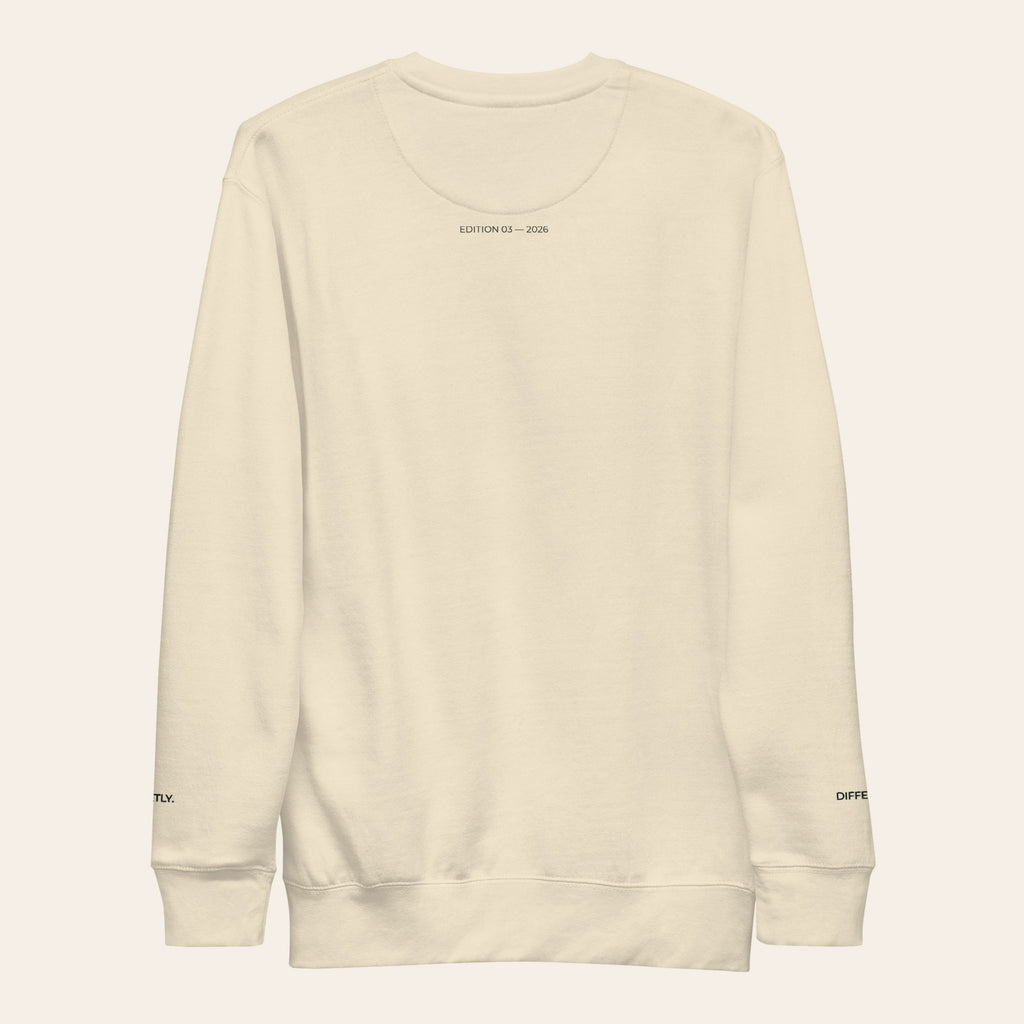 LOUPI GANG Morning Edition Crew in Bone, back view, EDITION 03 — 2026 printed in olive just below the collar.