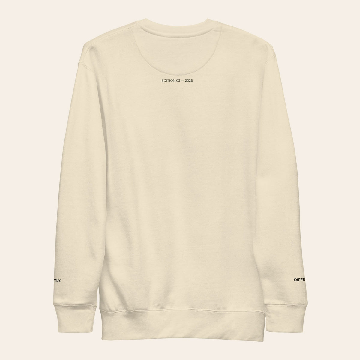 LOUPI GANG Morning Edition Crew in Bone, back view, EDITION 03 — 2026 printed in olive just below the collar.