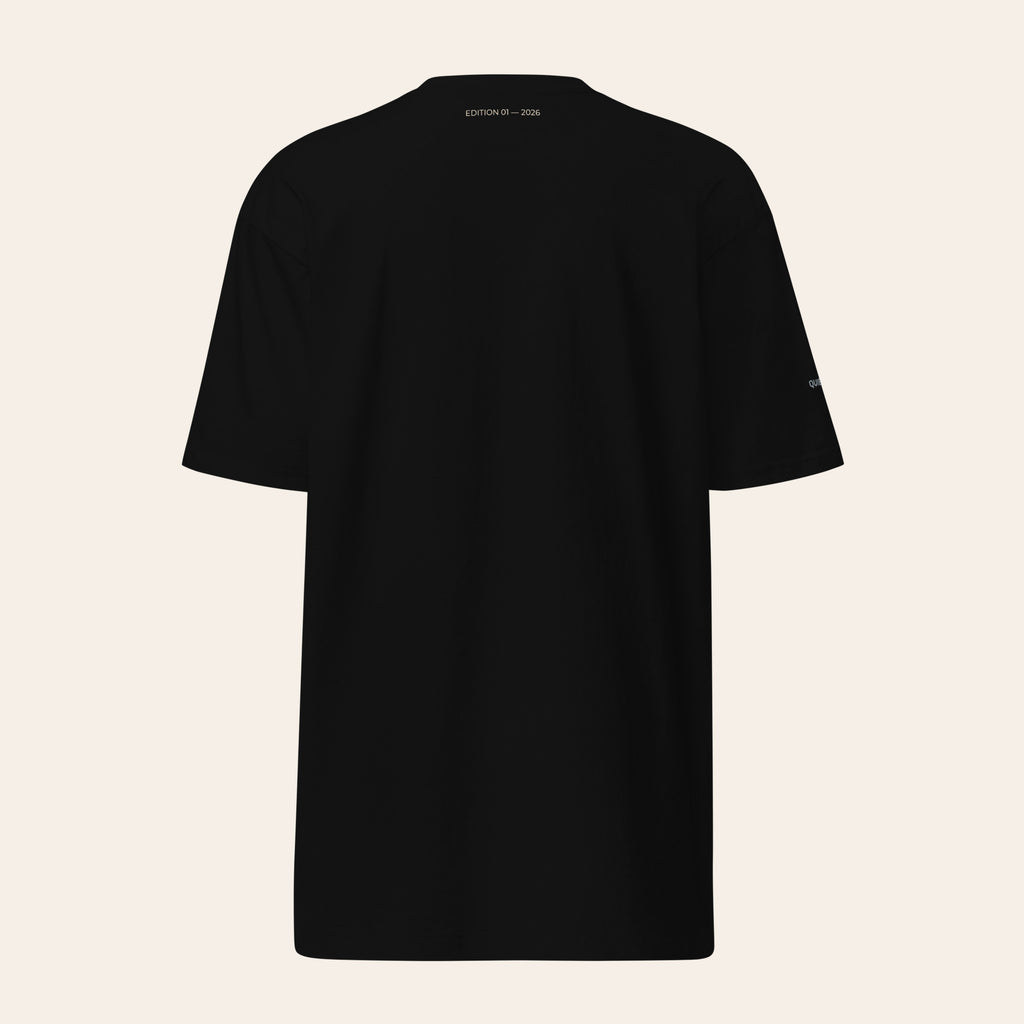 LOUPI GANG Signature Heavyweight Tee in Black, back view, small EDITION 01 — 2026 print below the collar