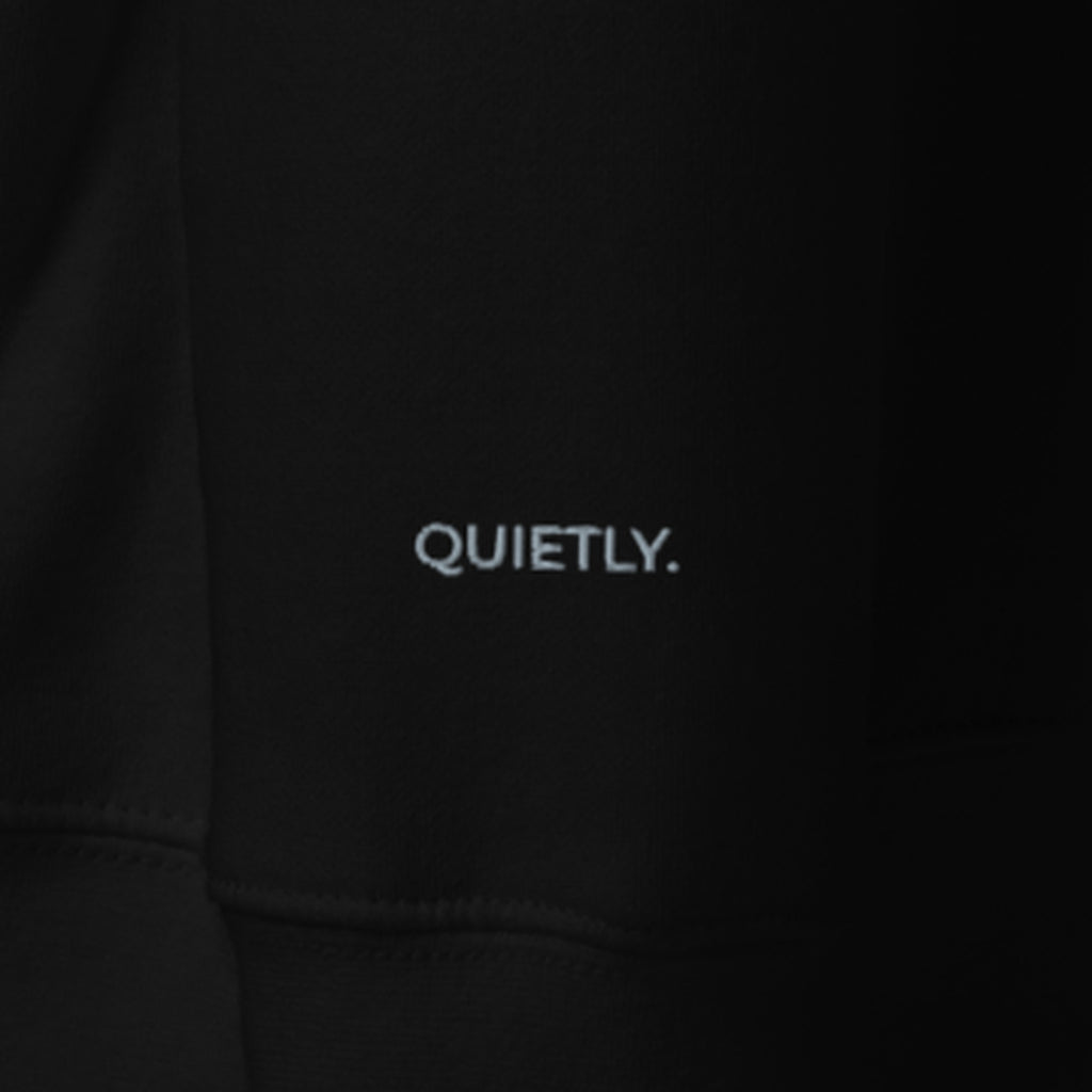 LOUPI GANG Afterhours Crew in Black, left cuff with QUIETLY. embroidered in grey thread