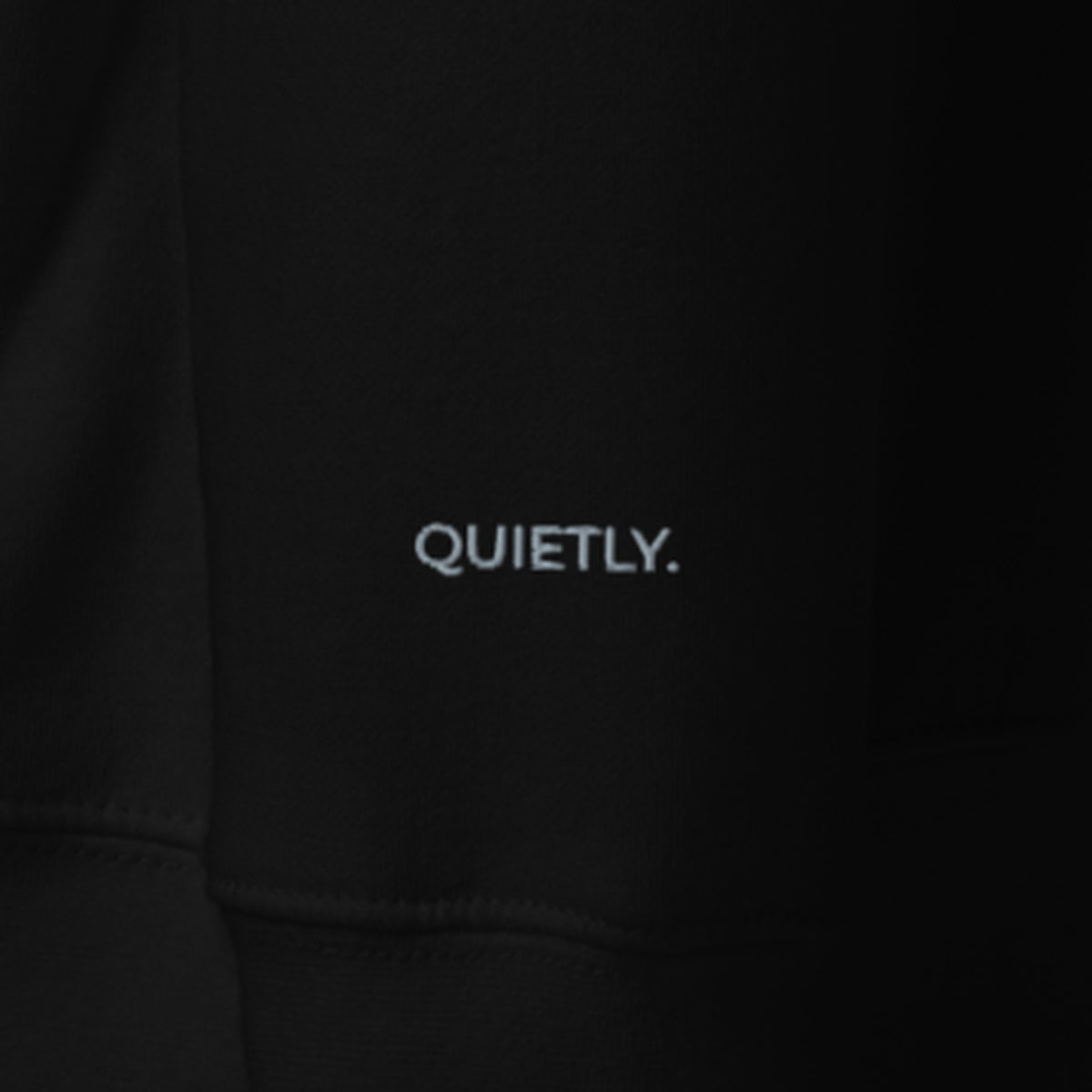 LOUPI GANG Afterhours Crew in Black, left cuff with QUIETLY. embroidered in grey thread