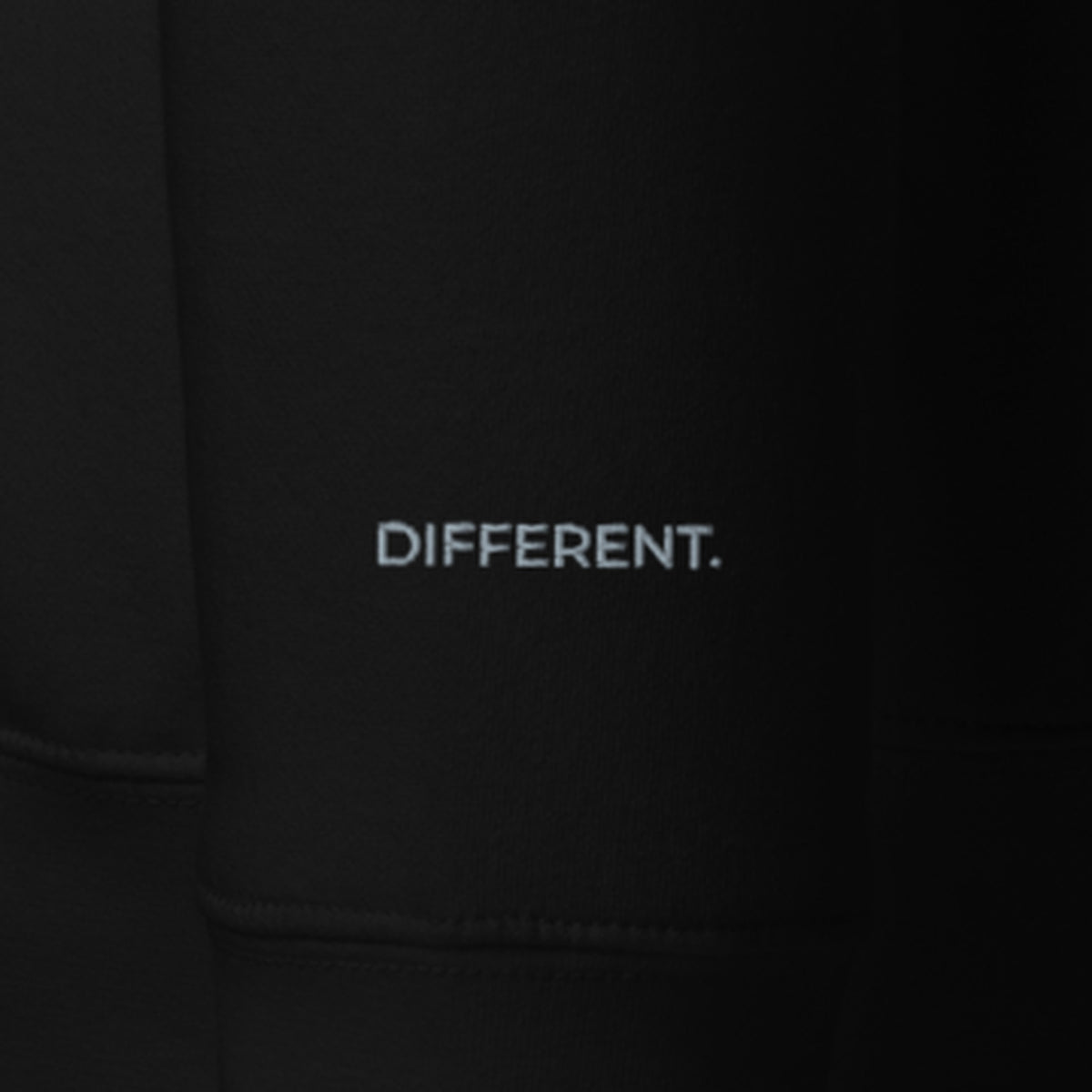 LOUPI GANG Afterhours Crew in Black, right cuff with DIFFERENT. embroidered in grey thread