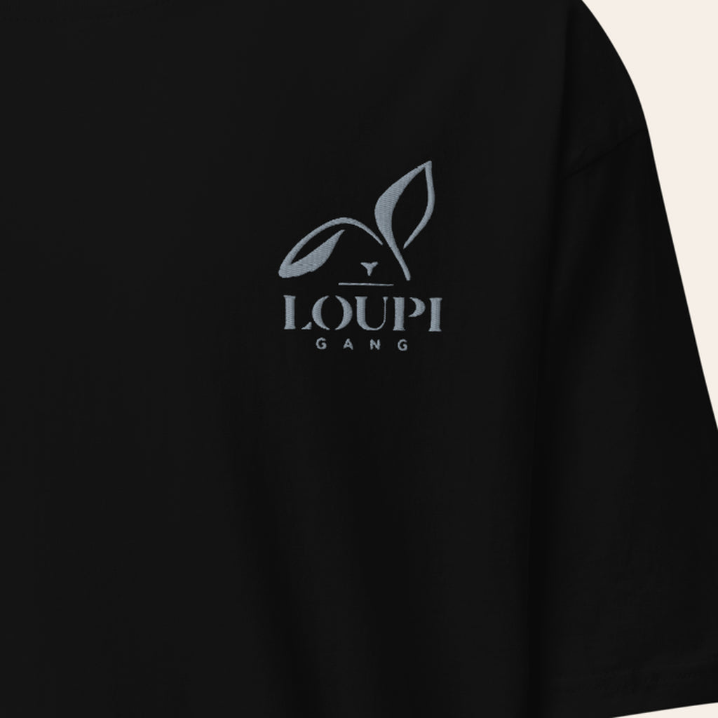 LOUPI GANG Signature Heavyweight Tee in Black, close-up of the grey embroidered rabbit logo on the left chest