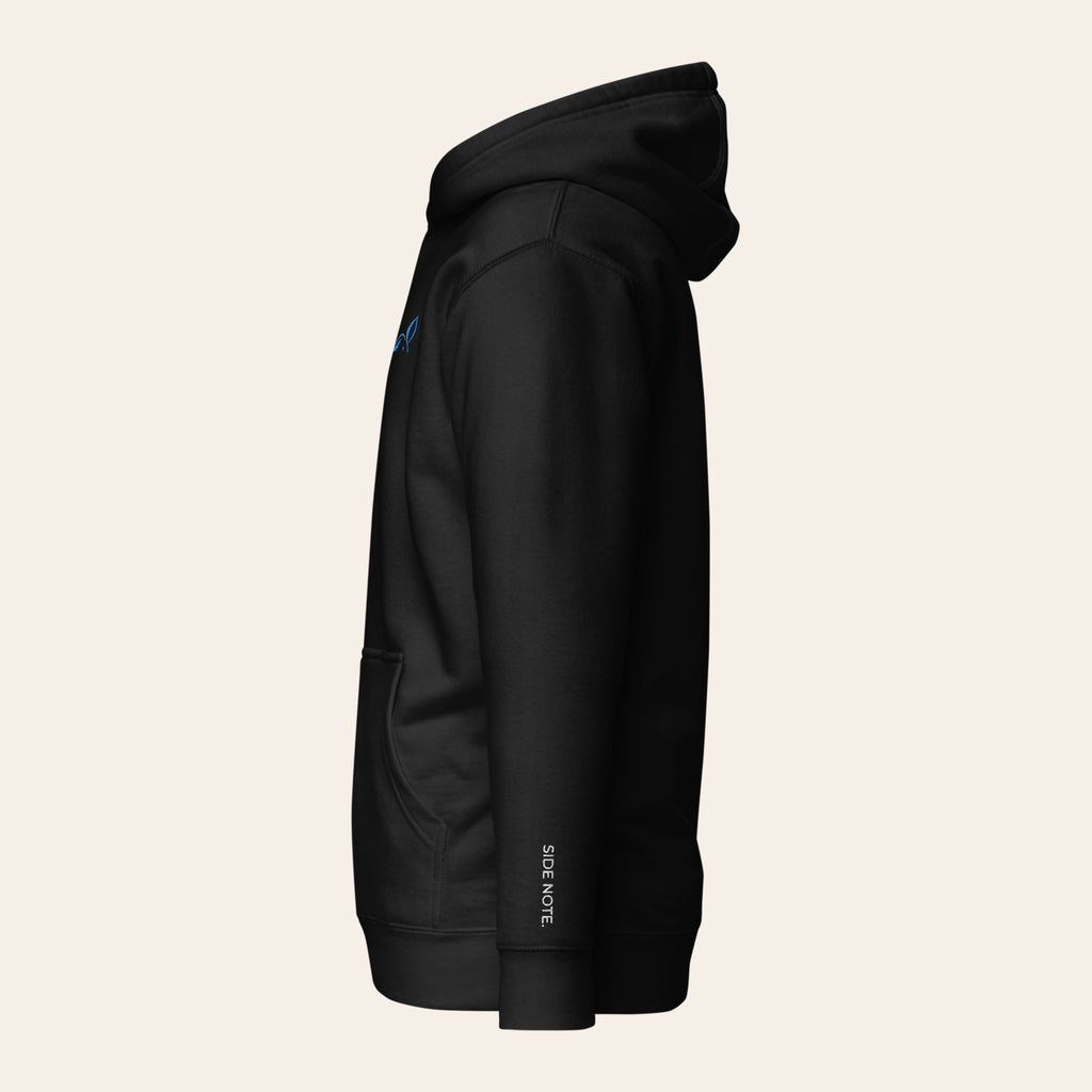LOUPI GANG Side Note Hoodie in Black, left side view with the light blue rabbit at the chest edge and SIDE NOTE. on the wrist.