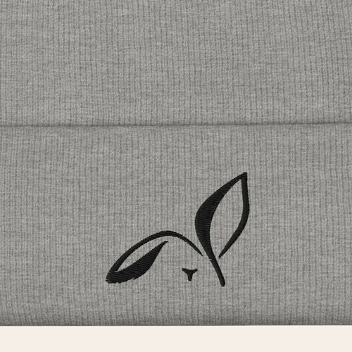 LOUPI GANG Icon Beanie in Heather Grey, close-up of the black embroidered rabbit on the ribbed cuff