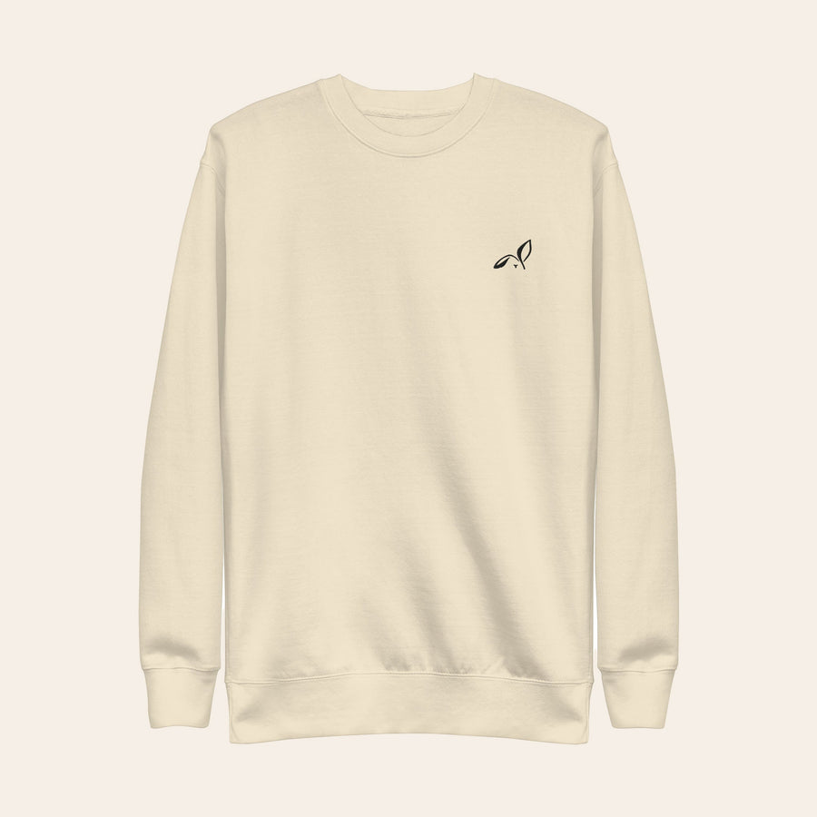 LOUPI GANG Signature Crewneck in Bone, front view, small black embroidered rabbit on the left chest